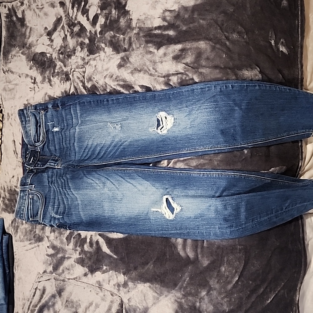 White House Black Market skinny jeans distressed with patches not holes